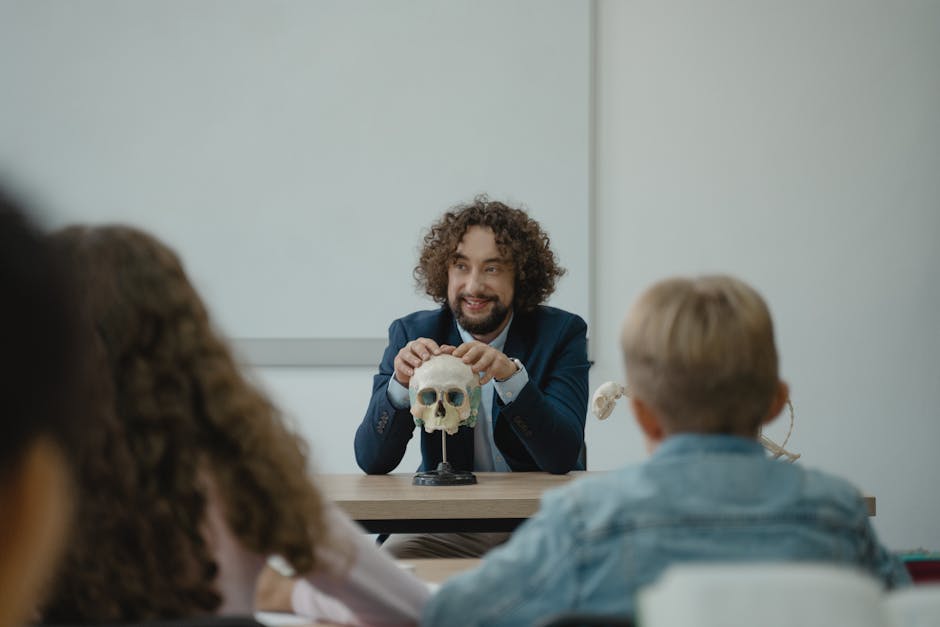 Teacher engaging students with a skull model in an interactive biology lesson